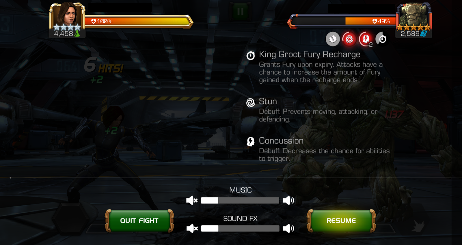 A screenshot showing the display of what the battle screen looks like when it has been paused. The status effects for the opponent are detailed under their health bar.